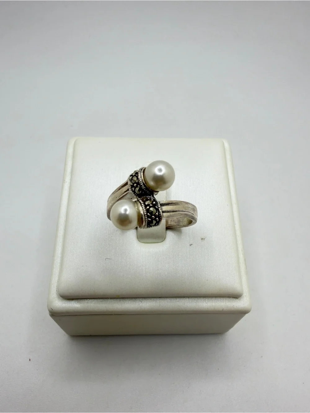 Sterling‎ silver stamped, faux pearl and marcasite bypass ring!